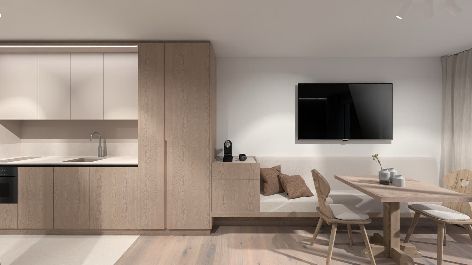Küche mit Sitzbank und Esstisch im Appartement Premium M